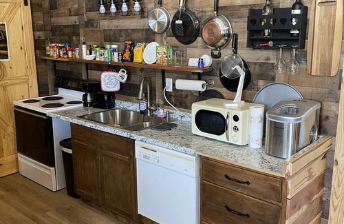 Smithville Cabin | The Desperado Inn is a charming secluded cabin with Mountain Fork River access
