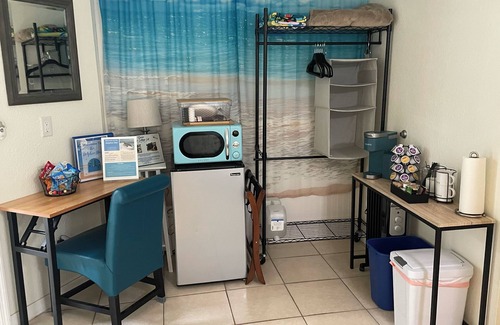 Cocoa Beach Apartment | The Dolphin Den- Blocks to the Beach and River~Kayaks and Bikes provided!