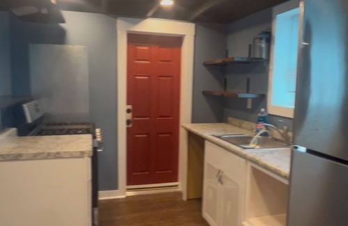 Mid City North Condo | The Fireman's Houz stands 3 mins from Exxon Mobile BR with huge yard