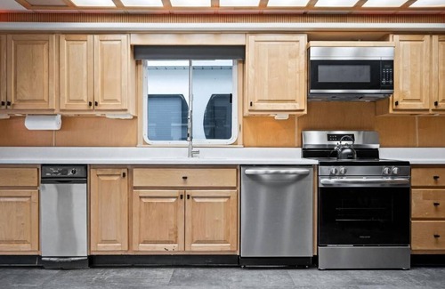 Allons Boat Rental | The Flagship Houseboat 84' - Largest Houseboat, 6 bedrooms,waterslide, fireplace on rooftop lounge area