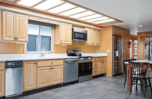 Allons Boat Rental | The Flagship Houseboat 84' - Largest Houseboat, 6 bedrooms,waterslide, fireplace on rooftop lounge area