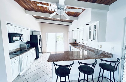 Discovery Bay House | The Flamingo House, Open & Breezy Island Home.minutes from the beach!