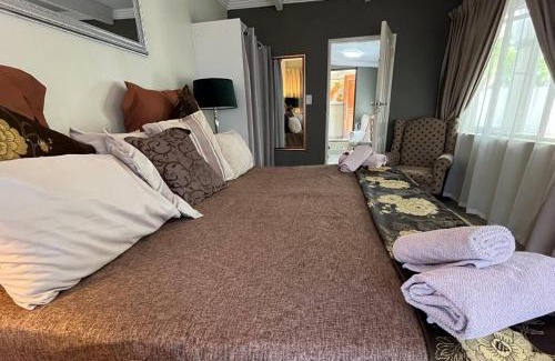 Waterkloof Glen House | The Flamingo Suite at Frederick's Place