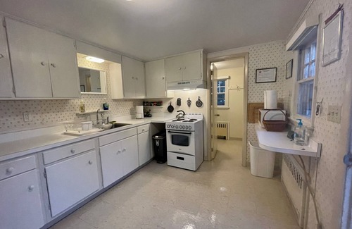 Pipes Cove Cottage | 'The Gate House'on Beach front Estate with Dockage. Walk to Village .