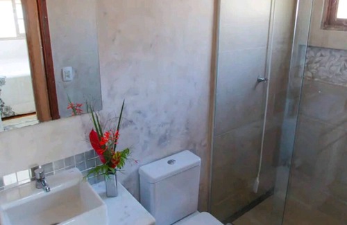 Lagoa da Conceicao House | The Gatehouse A Charming self contained house in lush tropical garden