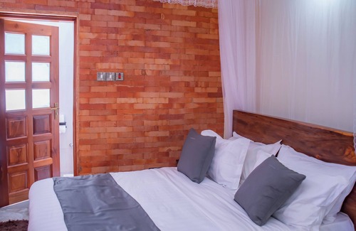 Kabale Bed & Breakfast | The Georges' Residence a luxurious villa providing white glove services.
