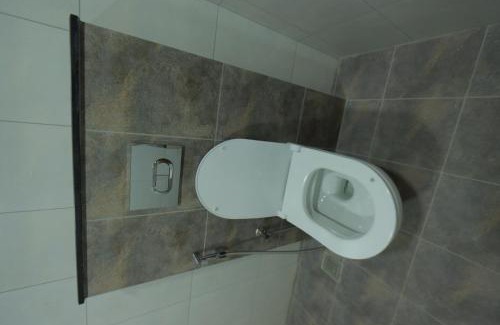 Palayam Apartment | The Golden Grotto