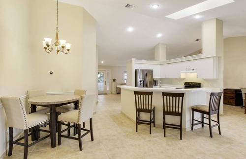 Fort Pierce House | The golden palm by the river
