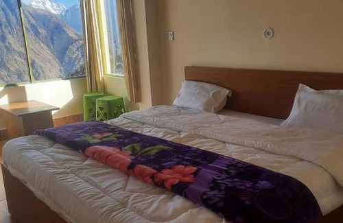 Auli House | The Grand Apple
