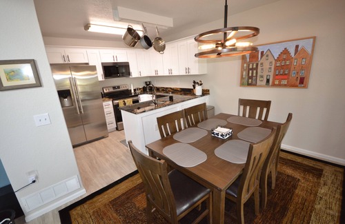 Northglenn House | The "Grandest Little Home" with Garage, 2 Decks, Sun Room, and 2 Person Hot Tub