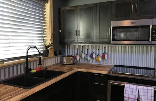 Courtenay House | The Guest Barn on Rennie