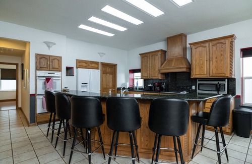 Haslet House | The Hands Down COOLEST Stay in Fort Worth - Active Airplane Hangar