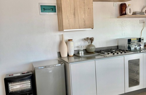 Harare East Apartment | The Hayhill Treetop Escape Apartment offers scenic views overlooking Harare.