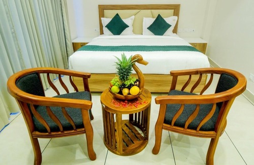 Thampanoor Hotel | THE HEARTLAND INN