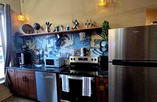 Petersburg Apartment | The Henry Lofts 2-bedroom apt., dog friendly fenced yard, arcade, coffee shops