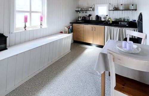 Faroe Islands Apartment | The Hidden People's Cottage by Vatnses Lake