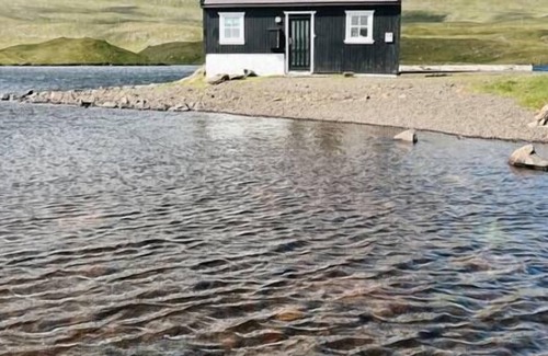 Faroe Islands Apartment | The Hidden People's Cottage by Vatnses Lake