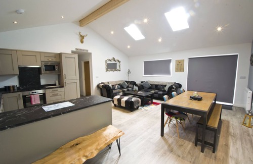Otterburn Cabin | The Hideaway - stunning 3 bedroom lodge with top of the range hot tub