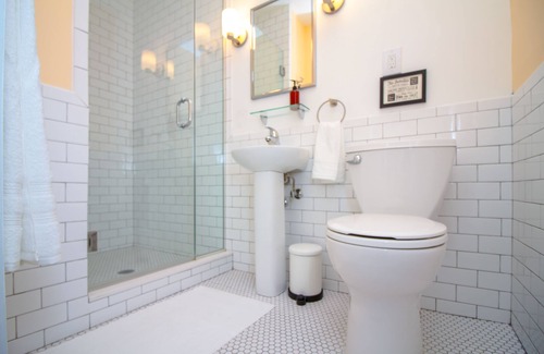 Queens Condo | The High Tide Studio #7 Studio Bedroom Hotel Room by RedAwning