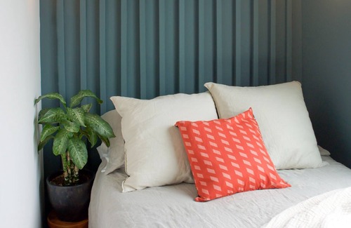 Queens Condo | The High Tide Studio #7 Studio Bedroom Hotel Room by RedAwning