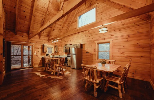 Rockbridge Cabin | The Hilltop - The Hilltop at Pine Creek Cabins and Camping in Hocking Hills, just minutes from Hocking Hills State Park. A cozy, yet spacious, pet-friendly cabin perfect for a reset surrounded by nature! Book your getaway today!