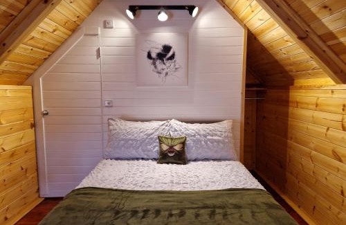 Amroth Apartment | The Hive - Unique log cabin with wood burning stove
