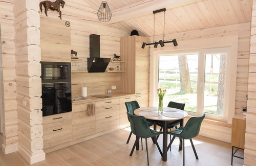 Klykiai House | The house is located in a quiet area, surrounded by forest pines.