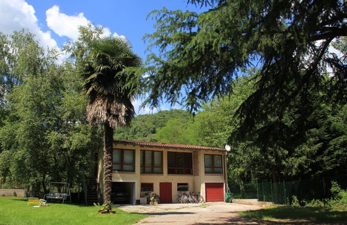 Fanna House | The House of the Cedars: renovated barn with garden in Fanna (Pn)