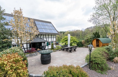 Ruppichteroth House | the hunterlike character of the house is reflecting all around