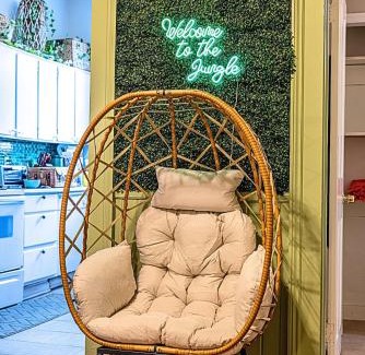 Savannah Victorian District Apartment | The Jungle Nook - Themed Getaway,Backyard,Grill