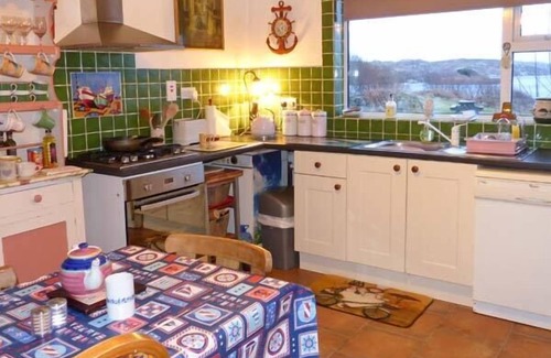Wild Atlantic Way Cottage | THE LAKE HOUSE, CONNEMARA in Lettermullen, County Galway
