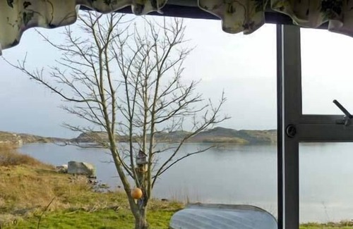 Wild Atlantic Way Cottage | THE LAKE HOUSE, CONNEMARA in Lettermullen, County Galway
