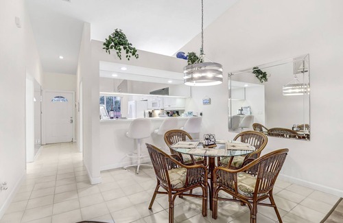 Naples Condo | The LARGEST Tropical Style Pool in S.W. Florida! GORGEOUS lake view!