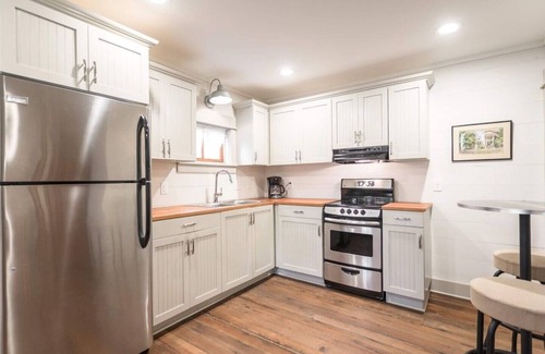 St. Marys Apartment | The Lil Pink House beckons, relax under the Live Oaks!