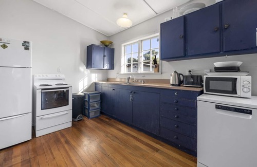 Waikanae House | The Little Blue Bach - Waikanae Beach Holiday Home