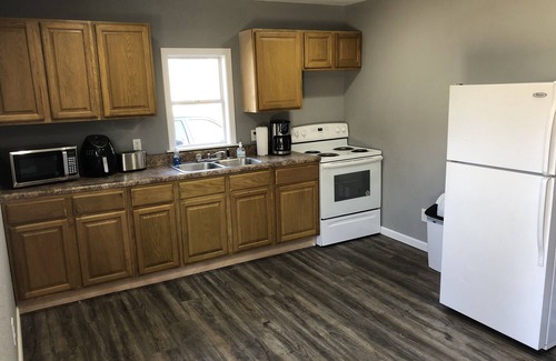 Van Buren Cottage | The Little Blue on 123 E Pine Street