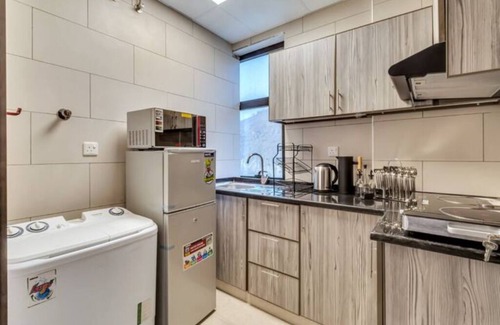 Falaj al Moalla Apartment | The Living