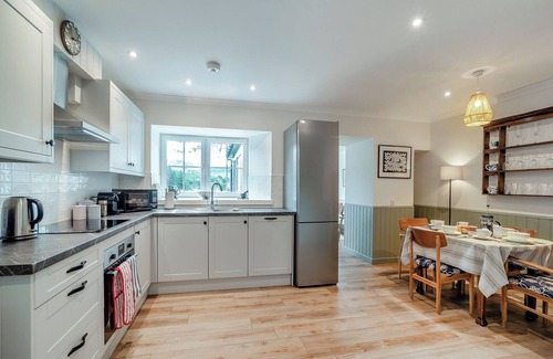Isle of Seil Cottage | The location sits beside the Atlantic bridge, offering uninterrupted sea views.