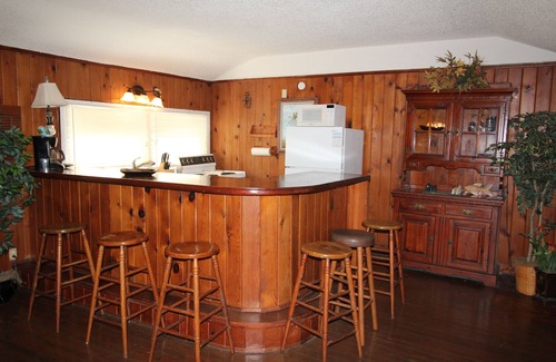St. Lucie Village House | The Lodge, cozy one bedroom King Cottage on the Indian River Lagoon