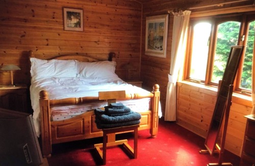 Cromarty Firth Cabin | The lodge has spectacular views of Cromarty Firth and Ben Wyvis mountain range.