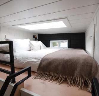 Tyendinaga Mohawk Territory Resort | The Loft - Stargazing Tiny Home with Firepit, Wood Fired Pizza Oven & Movie Projector
