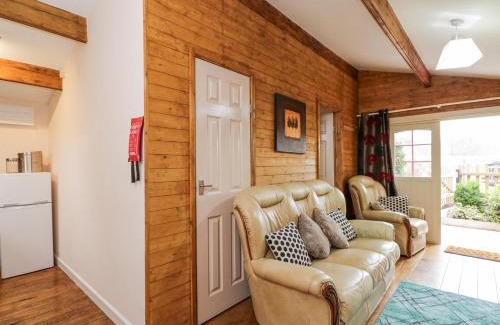 Bushton House | The Log Cabin