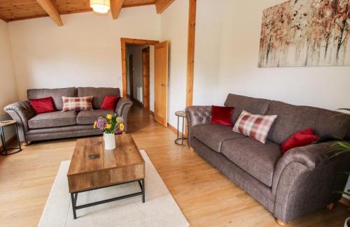 Newnham House | The Log Cabin