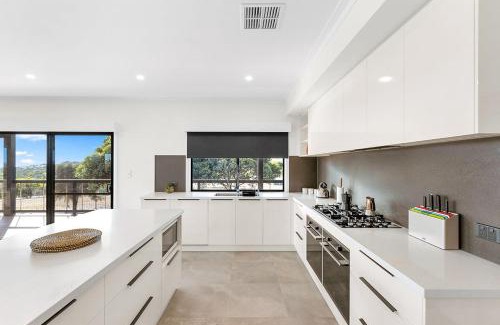 Boston House | The Lux Country Retreat - heated swimming pool - immaculate views and stylish comfort!