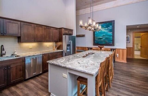 North Conway Condo | The Luxurious Penthouse Ski-in/Ski-out Kearsarge Brook Condo at Cranmore Mtn!