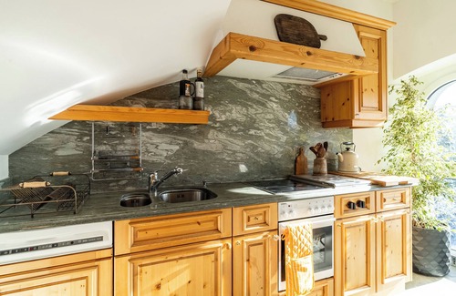 Waldhaus Flims Apartment | The luxury apartment, 135m2, above the roofs of Flims Waldhaus.