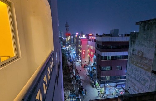 Madurai Apartment | The Madurai lounge-over looking Meenakshi temple. top floor of hotel Padmam