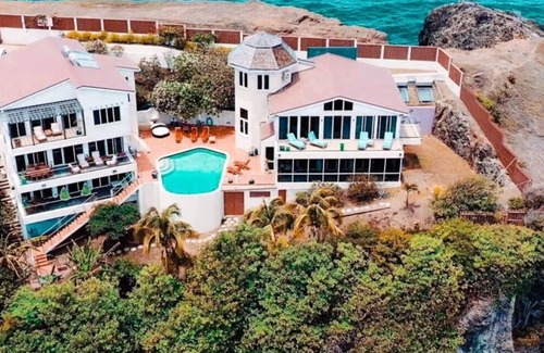 Lance aux Epines Villa | The Main Villa has three bedroom. The master bedroom, has its own patio.