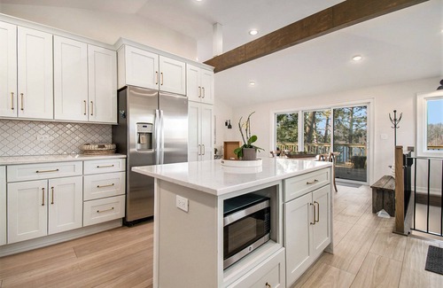 Sturgis House | The Maple & Oak - Lakefront Home with Private Beach