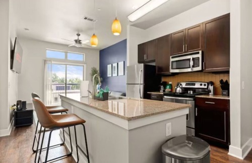 Arsenal Apartment | The Mariposa: Elegant 1BR Mid-Century Loft